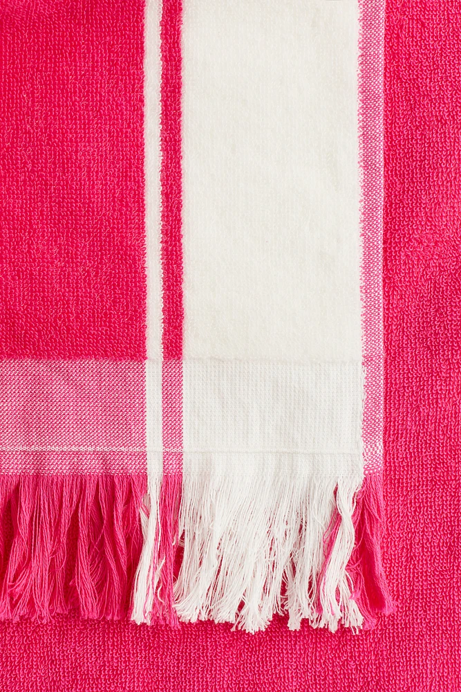 Serviette de plage frangée