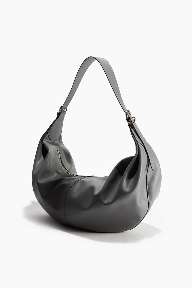 Sac à bandoulière de forme arrondie