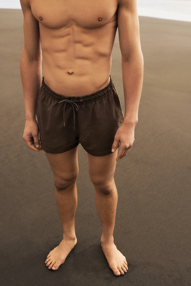 Embroidered-Pattern Swim Shorts