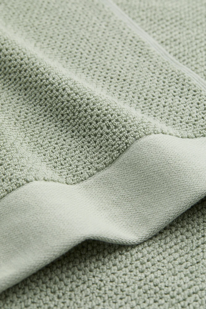 Serviette de bain en coton éponge