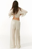 Pantalon large en tricot ajouré