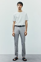 Pantalon aminci en tissu croisé de coton