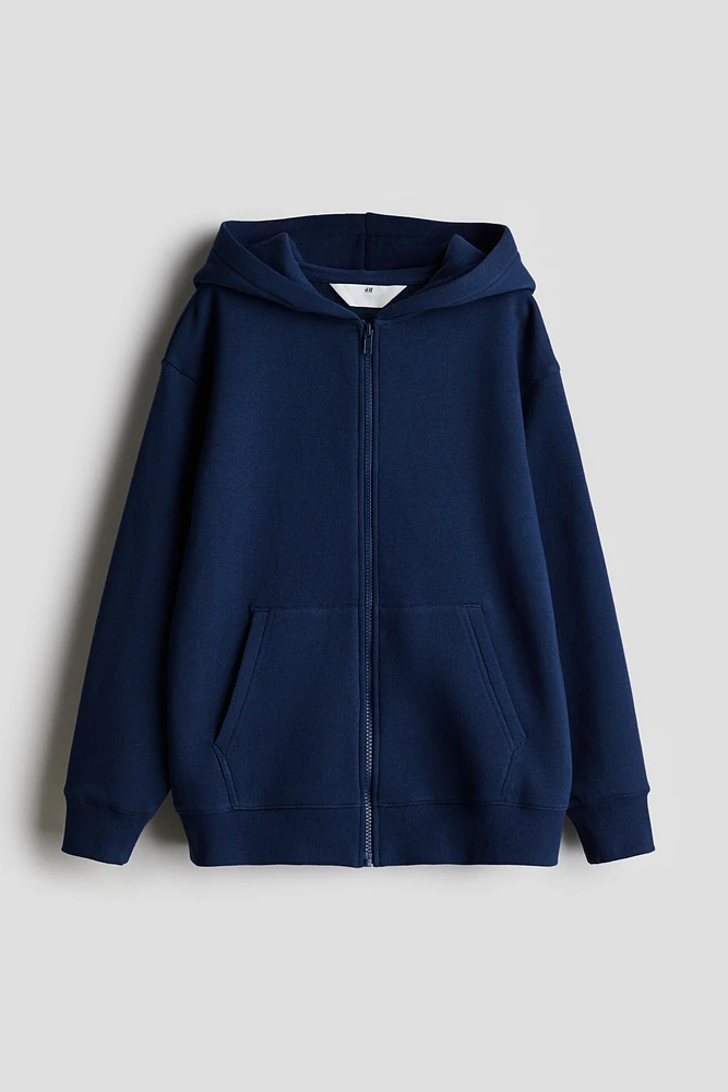 Veste à capuchon glissière