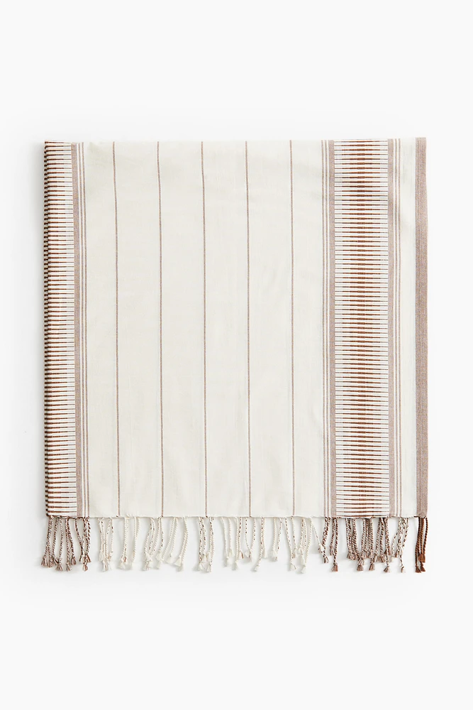 Serviette de plage en tissu jacquard