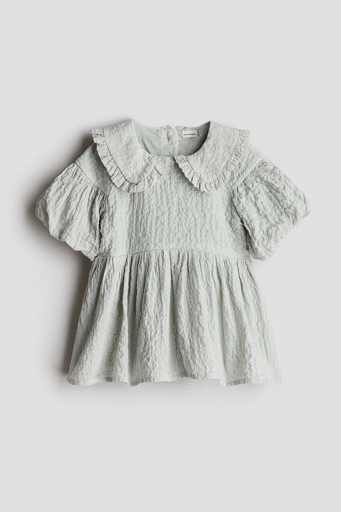 Robe en coton avec manches bouffantes
