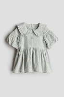 Robe en coton avec manches bouffantes