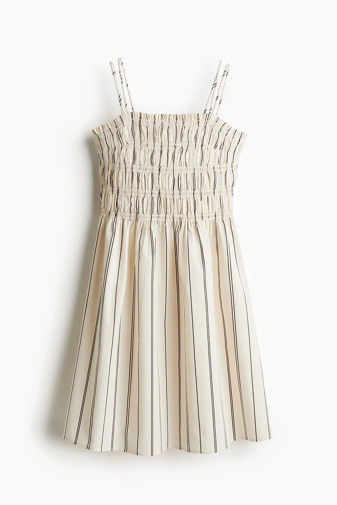 Robe en coton à corsage nid d'abeille