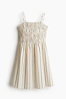 Robe en coton à corsage nid d'abeille
