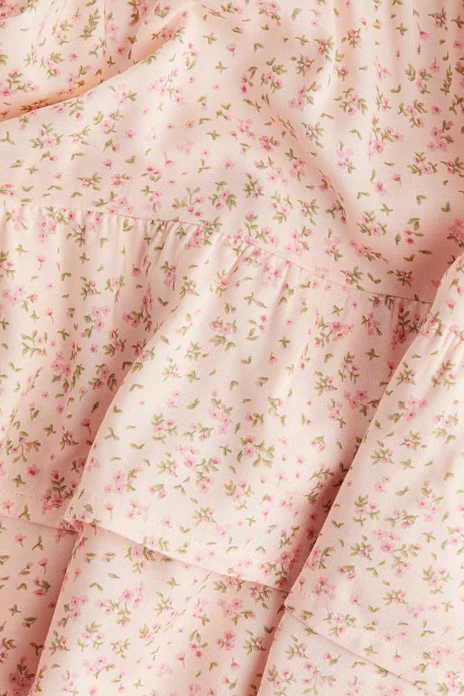 Robe avec détails en nid d'abeille