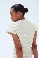 Haut en nid d'abeille de tricot pointelle
