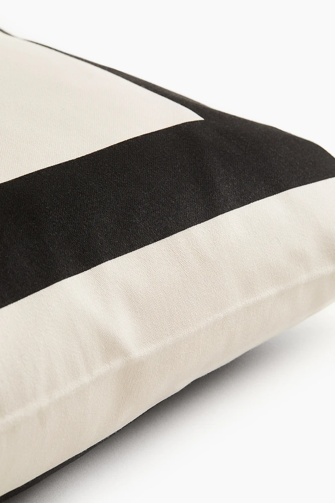 Housse de coussin en satin de coton