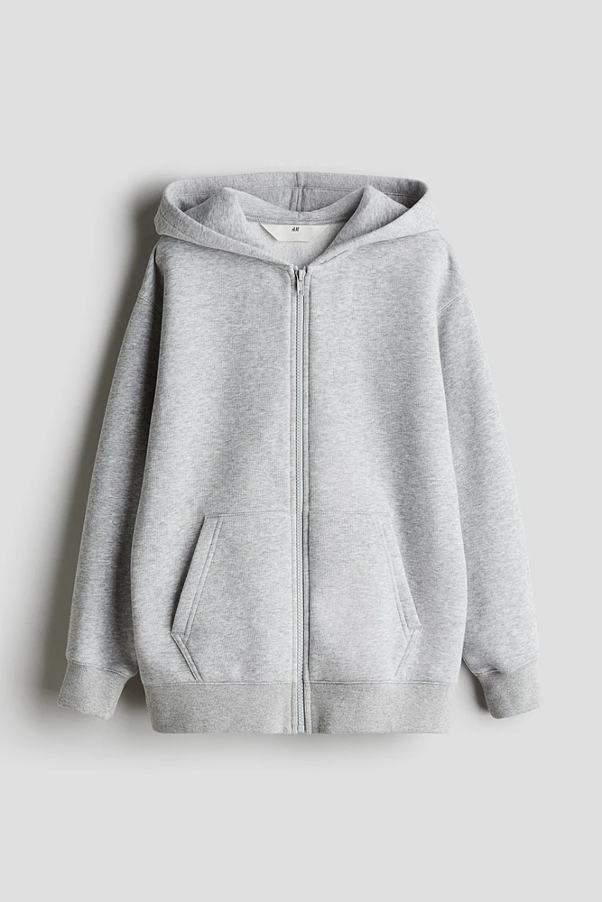 Veste à capuchon glissière