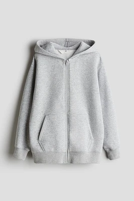 Veste à capuchon glissière