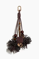Décoration de sac à pompons