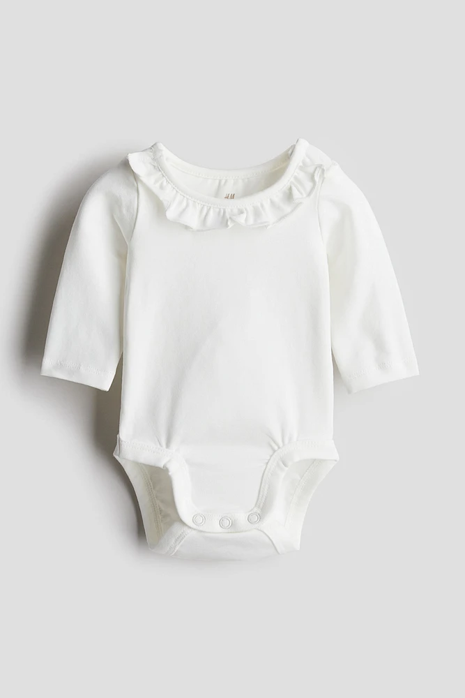 Combiné en coton avec col à volant
