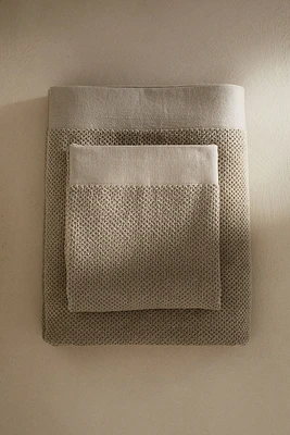 Serviette de bain en coton éponge