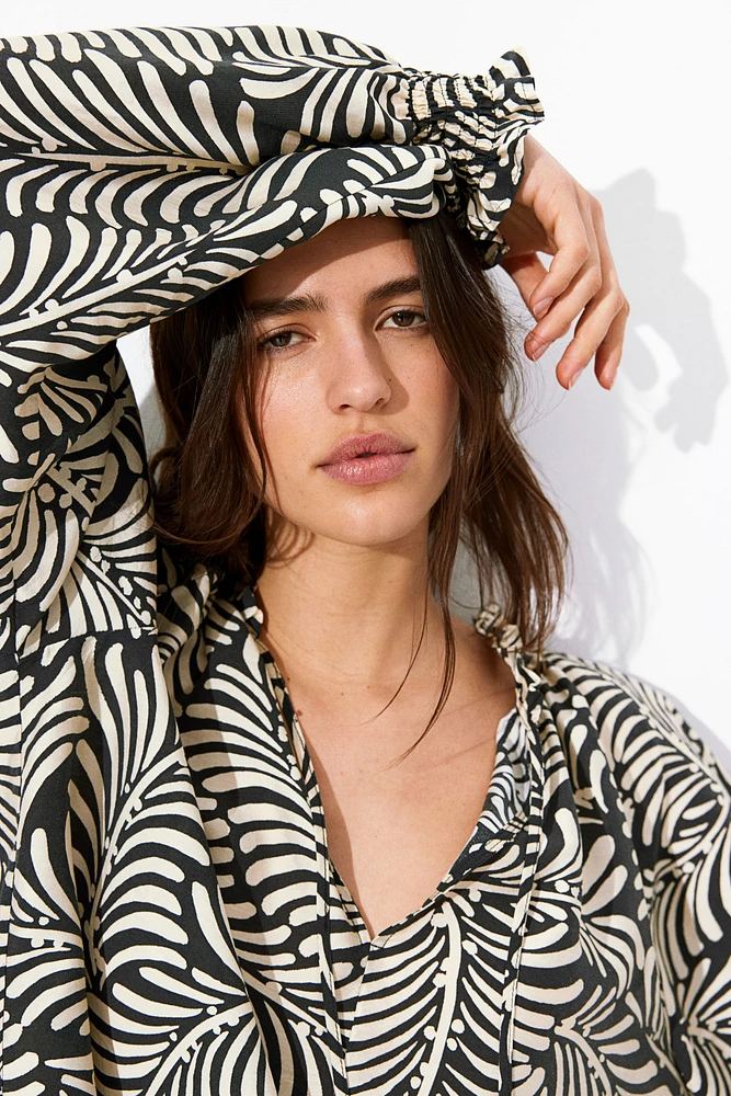 Blouse ample avec col à nouer