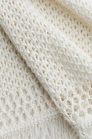 Fringe-trimmed pointelle-knit skirt