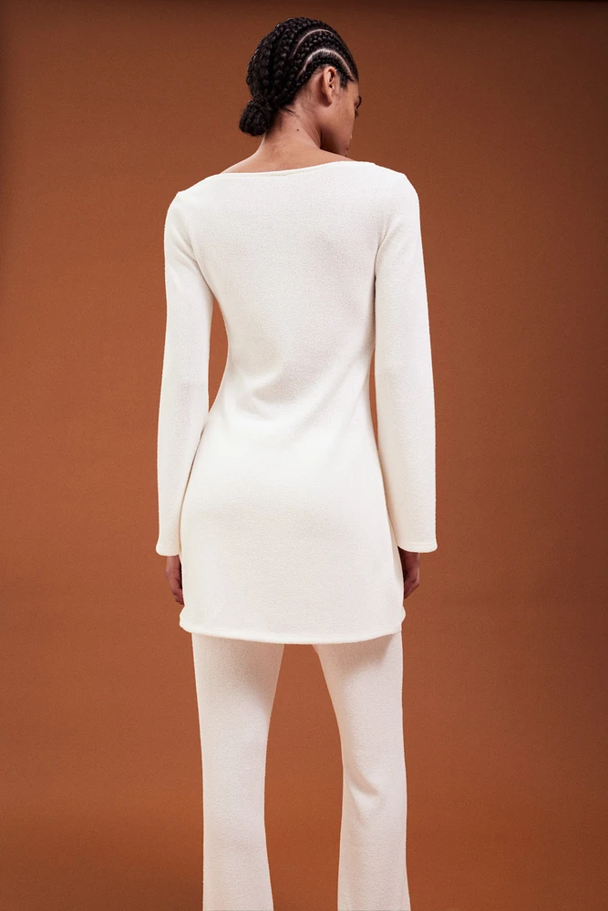 Robe en tricot avec jupe évasée