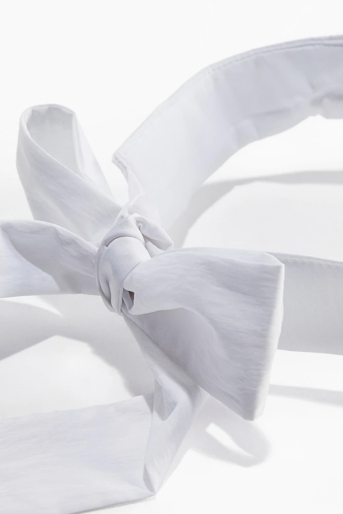 Bow-Detail Sun Visor