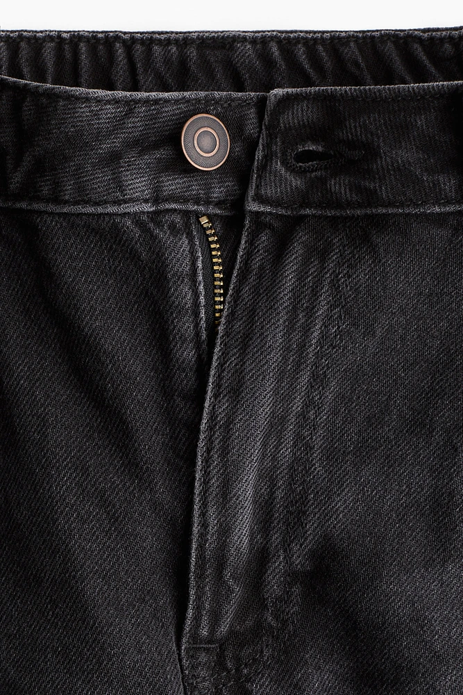 Short en denim à bords frangés