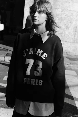 Sweatshirt with Text Motif