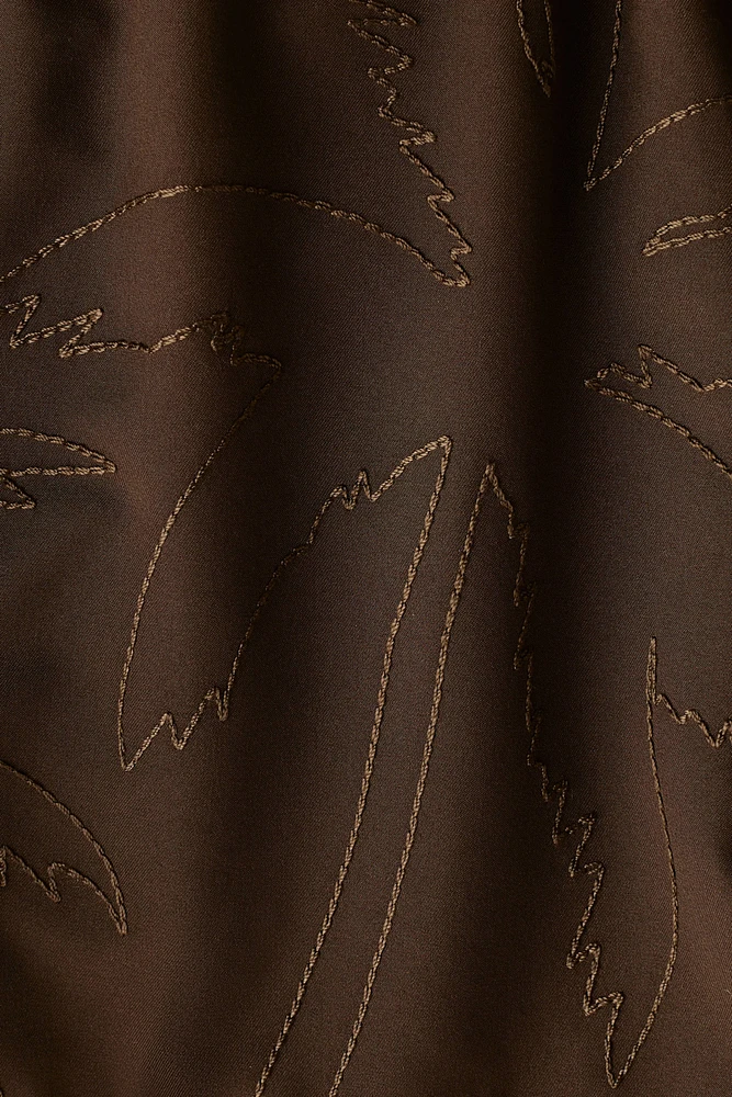 Embroidered-Pattern Swim Shorts