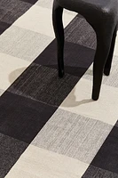 Tapis tissé à plat avec décor à carreaux