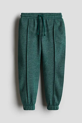 Pantalon de jogging avec plis marqués