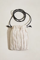 Linen-blend drawstring phone bag