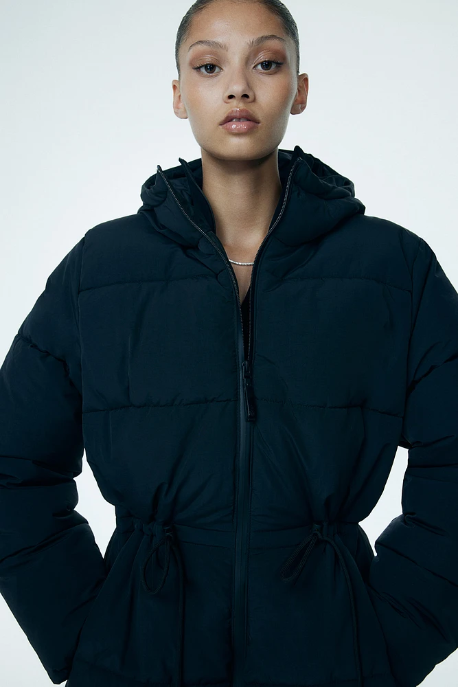 Oversized drawstring-waist puffer jacket