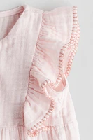 Ruffle-Trimmed Muslin Romper Suit
