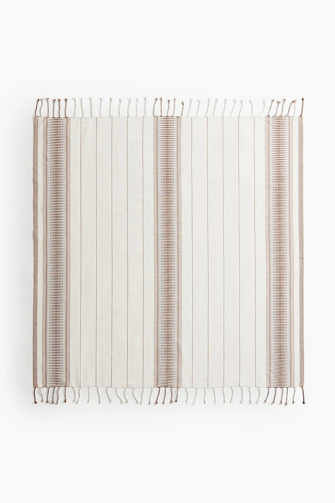 Serviette de plage en tissu jacquard