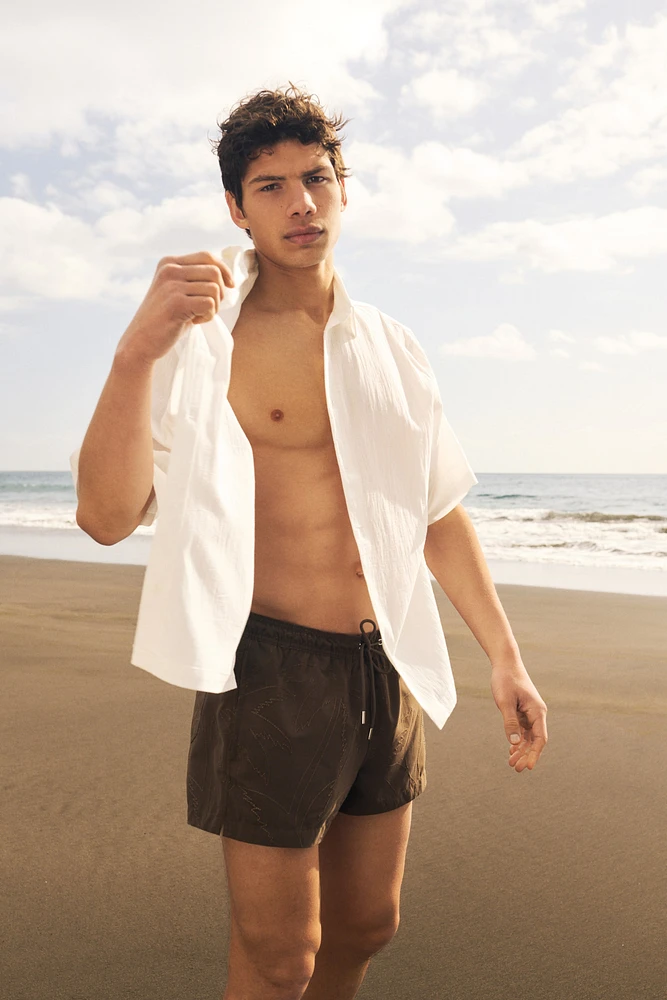 Embroidered-Pattern Swim Shorts