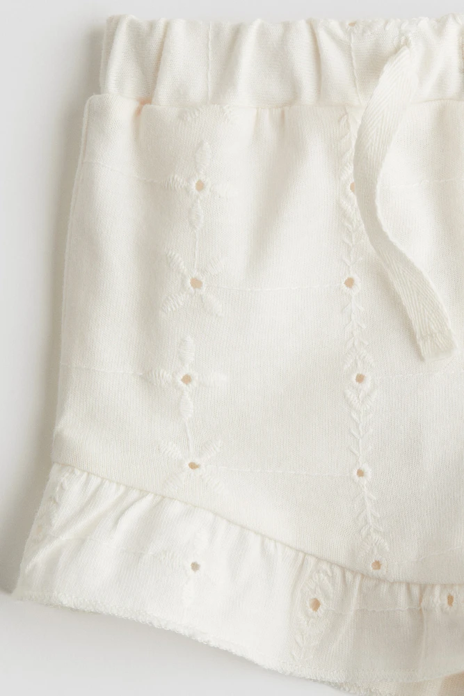 Short en jersey avec broderie anglaise