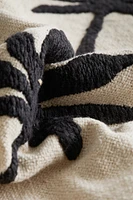 Housse de coussin brodée