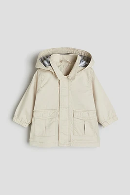 Parka en coton avec capuchon