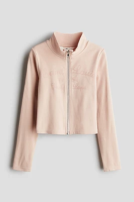 Veste à glissière avec motifs