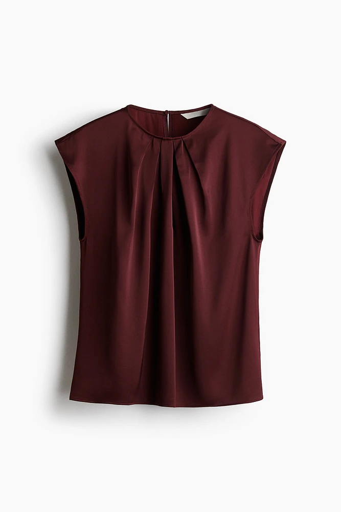 Blouse avec plis devant