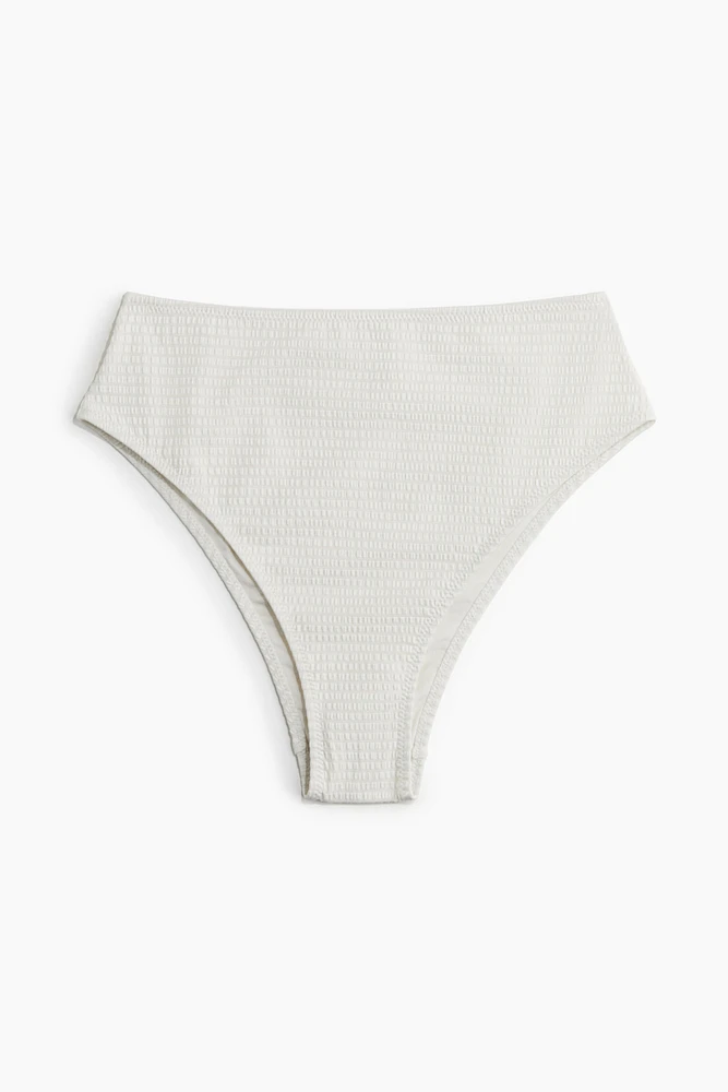 Bas de maillot échancré taille haute