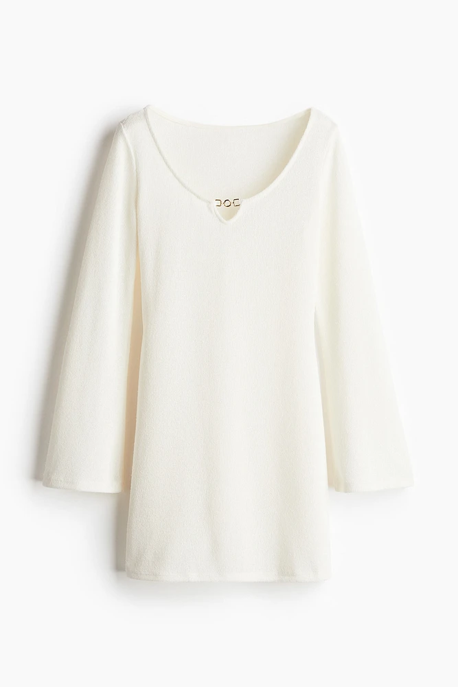 Robe en tricot avec jupe évasée