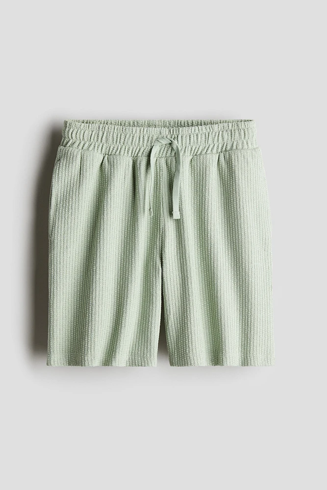 Short en tricot texturée