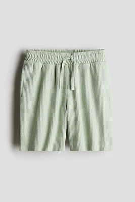 Short en tricot texturée