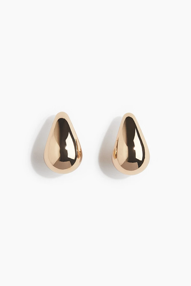 Boucles d'oreilles épaisses et bombées