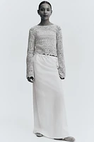 Haut court en tricot pointelle