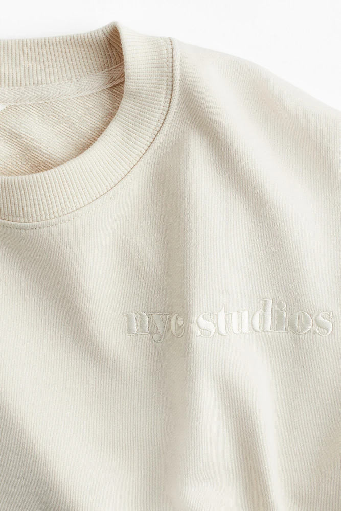 Sweatshirt with Text Motif