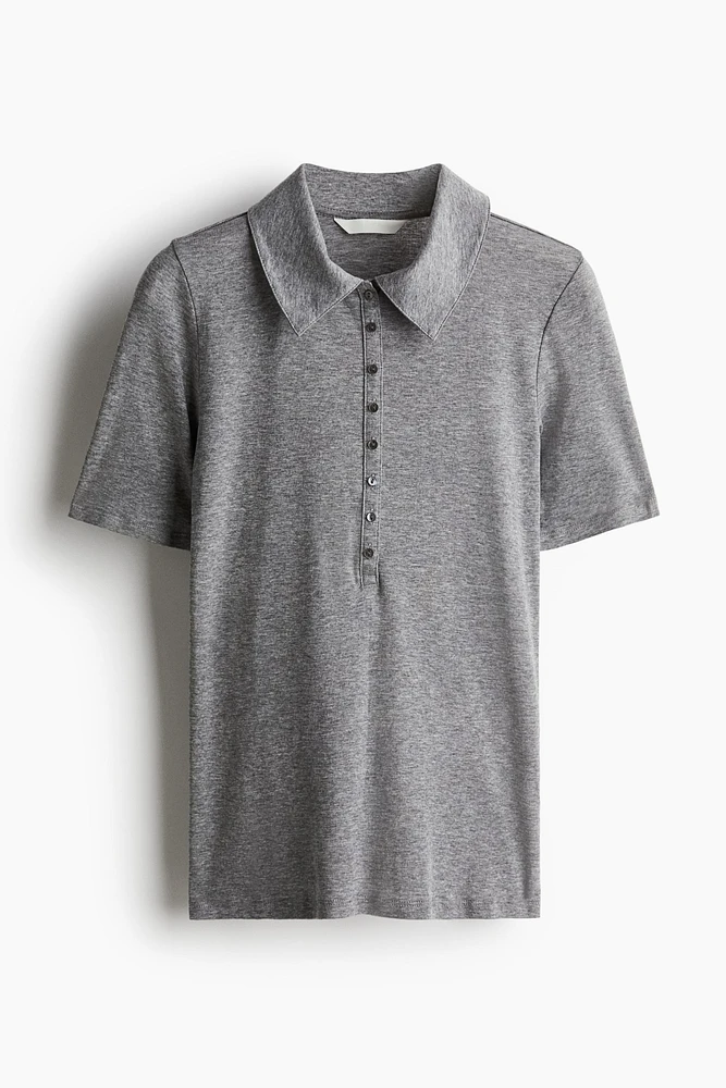 Polo ajusté