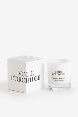 Bougie parfumée dans un pot en verre