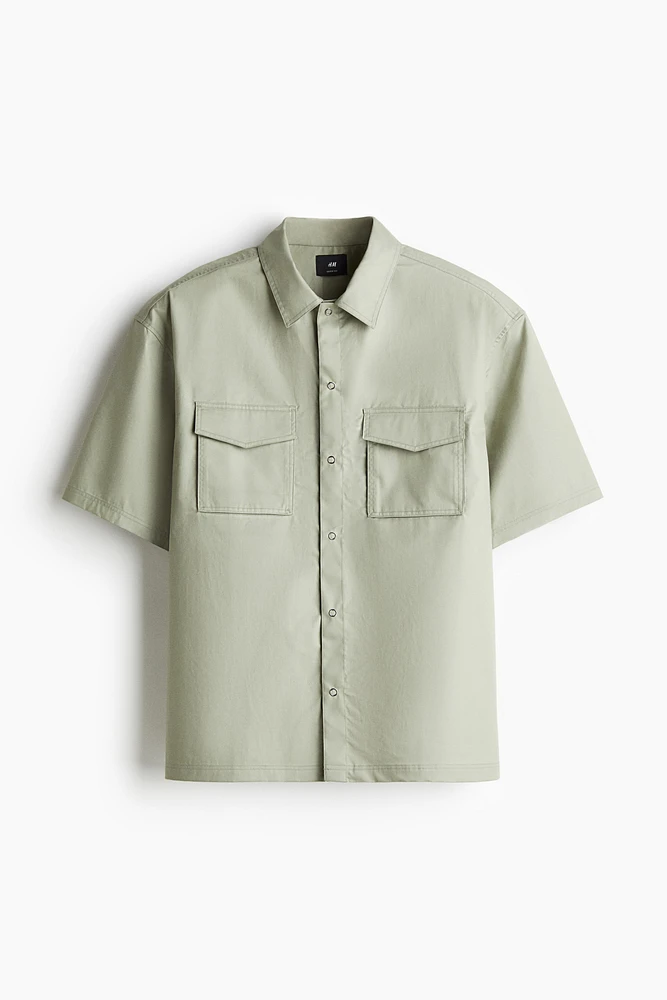 Chemise utilitaire à manches courtes coupe ample