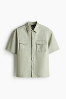 Chemise utilitaire à manches courtes coupe ample